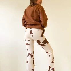 Bailey Rose Never Settle Cow Print Pants Featured