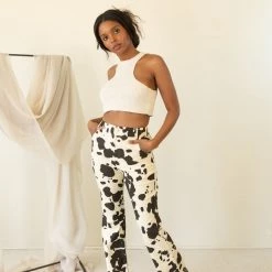 Emory Park Featured Here Now Cow Print Flare Jeans