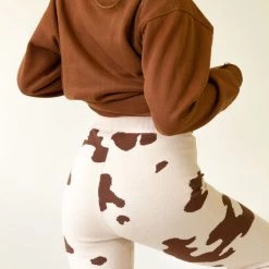 Bailey Rose Never Settle Cow Print Pants Featured